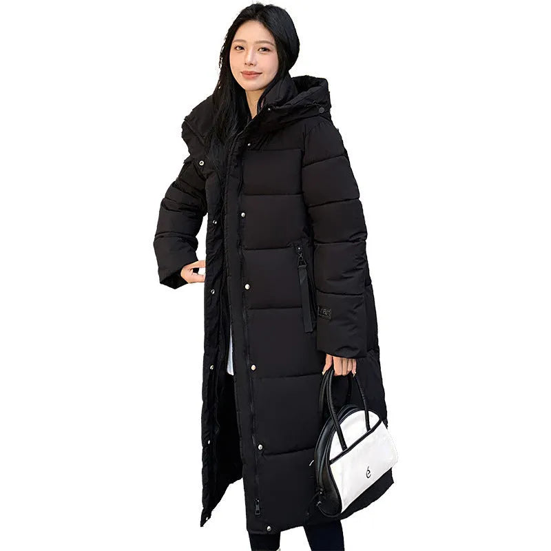 Korean-style quilted cold-proof jacket in black, shown with regular long sleeves.