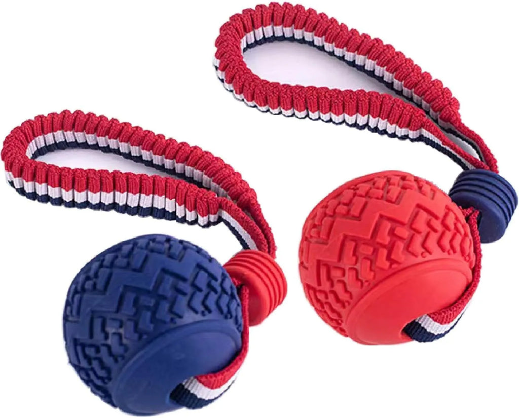 Blue and red natural rubber dog ball with attached rope toy for medium and small breeds.
