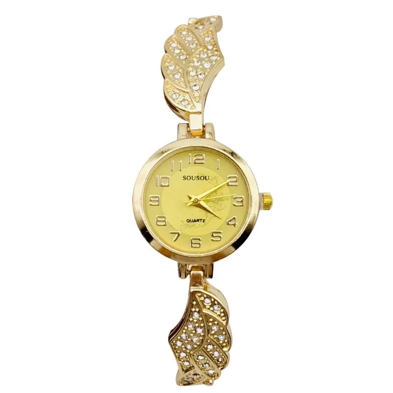 Round stainless steel women's watch with gold dial surface and Vachette clasp buckle