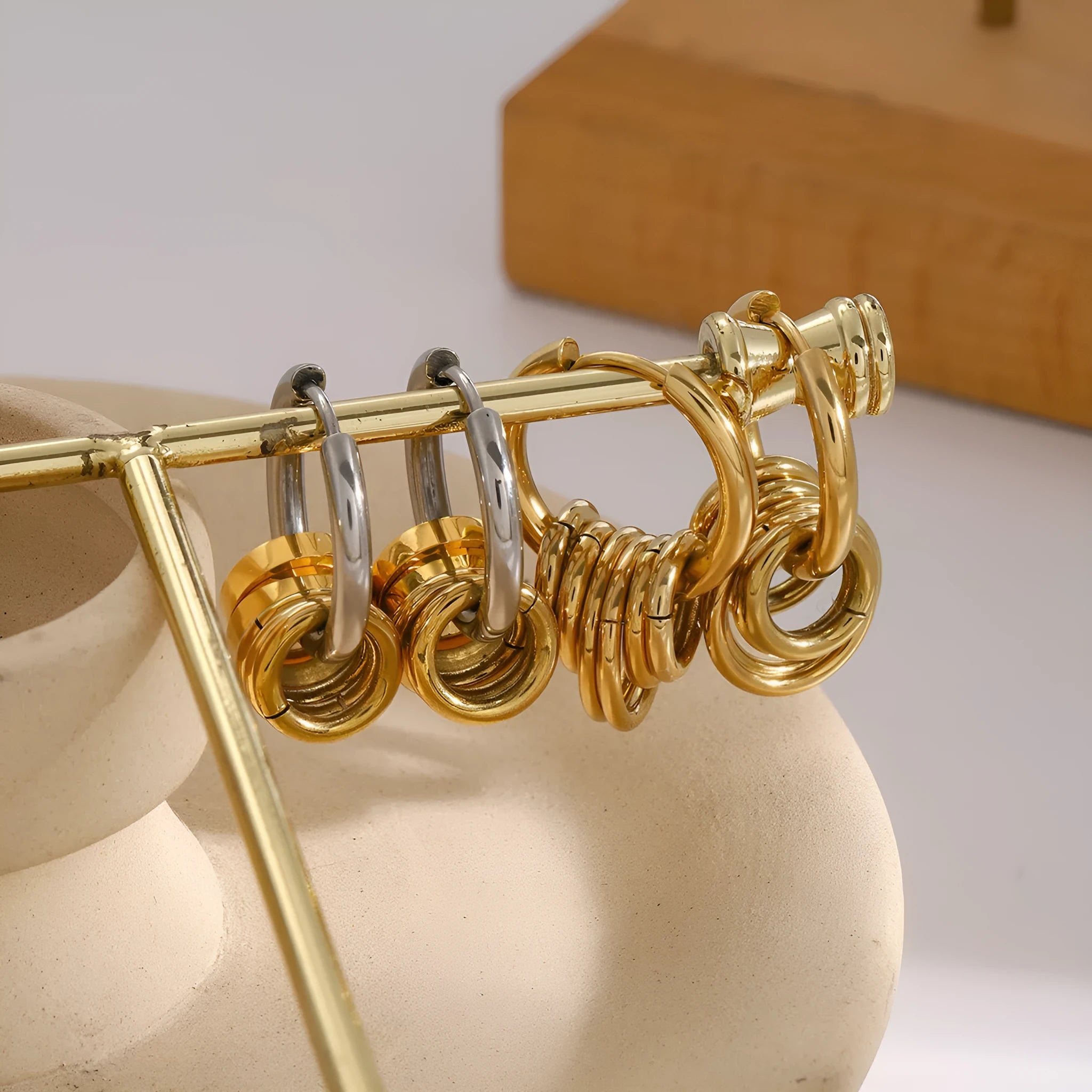Stainless steel ins style earrings with an electroplated metallic finish.
