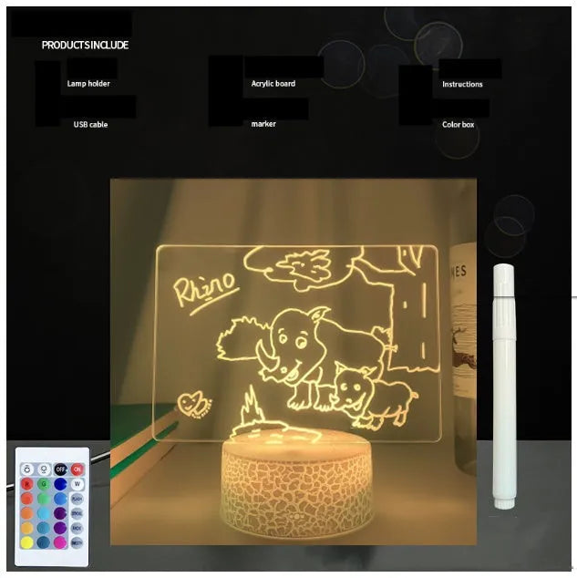 Black 3D acrylic LED night light and message board with stylus on a desktop