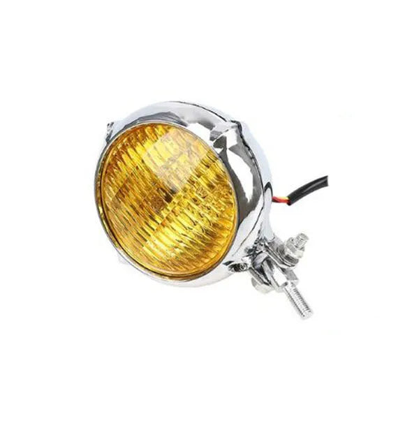 Black retro-style aluminium motorcycle headlight for Harley models with yellow glass lens.