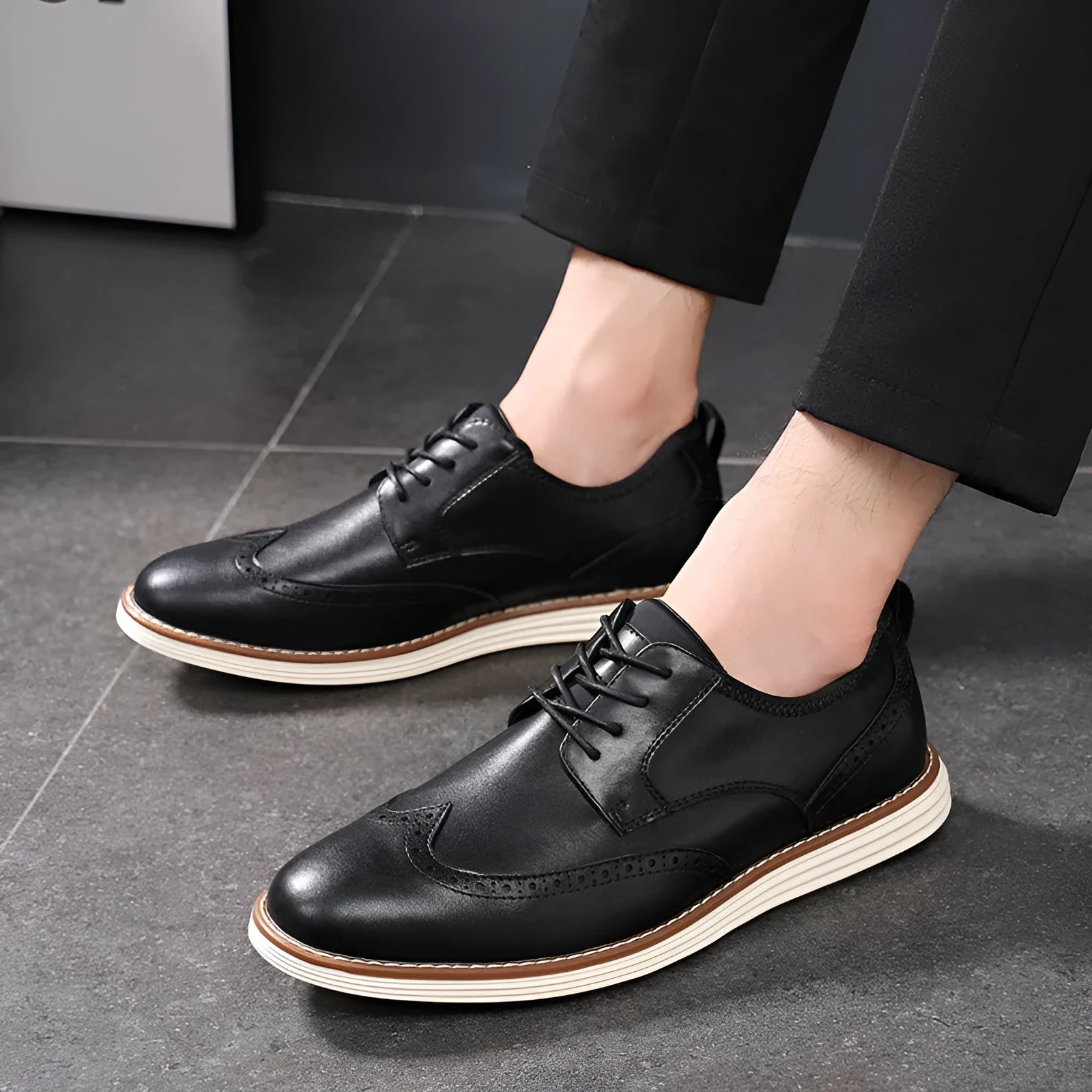 Men's black and brown slip-on business casual shoes with round toe and low-top design