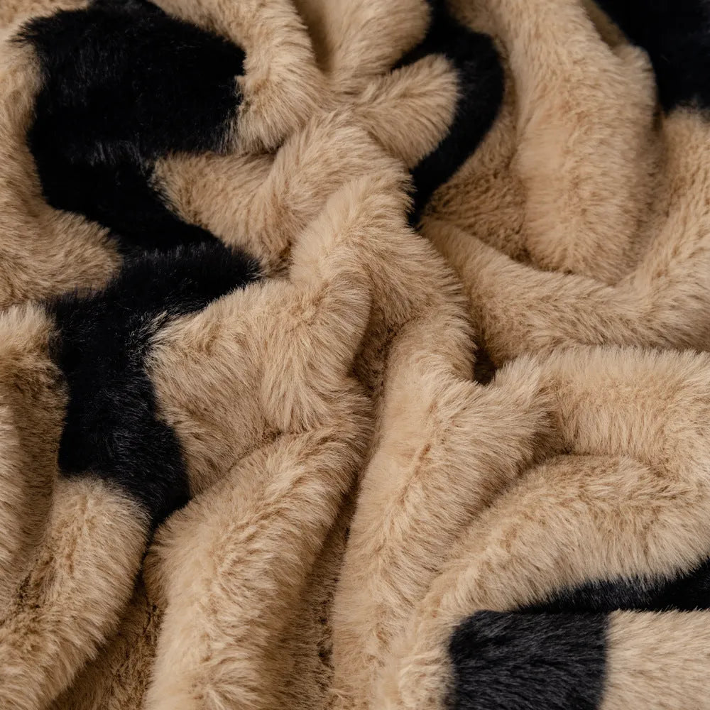 Zebra pattern flannel sofa cover and pillowcase in caramel colour on a sofa