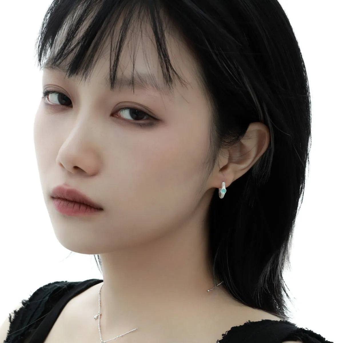 925 silver geometric ear clip with circular design in burnt silver finish