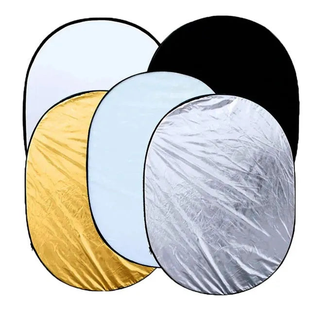 5 in 1 collapsible photography reflector showing gold, silver, white, black, and translucent surfaces