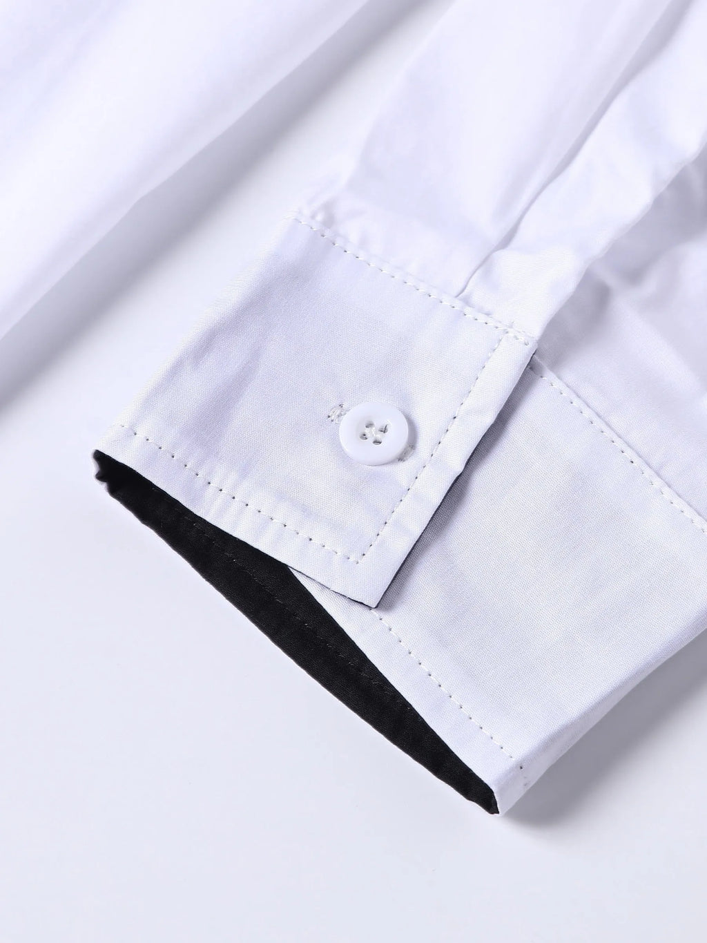 White long-sleeved shirt with black contrasting collar and cuffs for teenage men