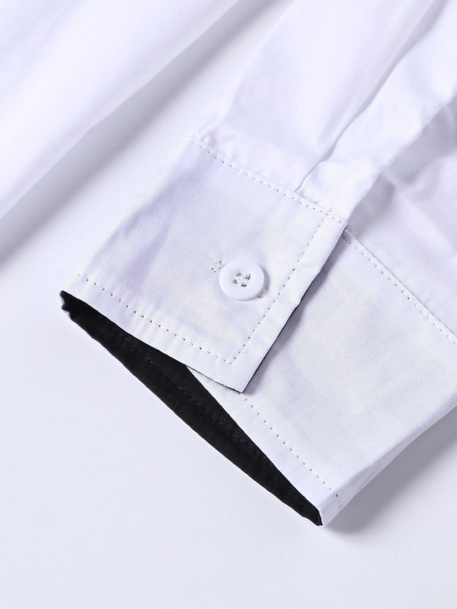 White long-sleeved shirt with black contrasting collar and cuffs for teenage men