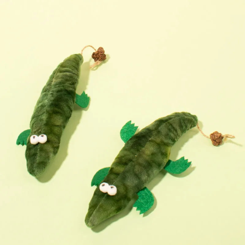 Green plush alligator shaped cat toy with catnip and peppermint for oral cleansing and stress relief