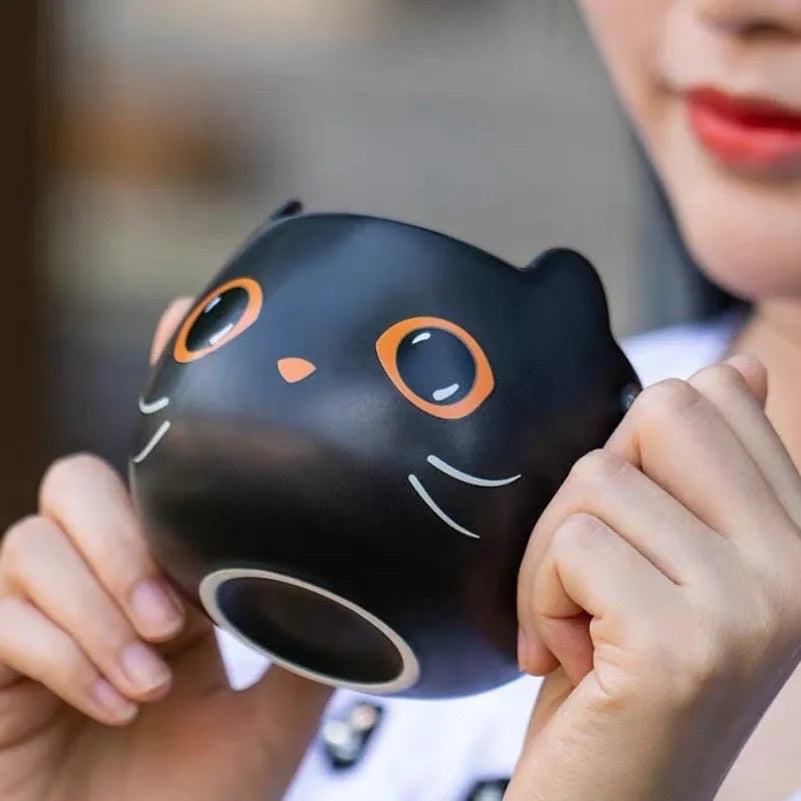 Black ceramic cat-shaped mug with covered spoon lid, 355ml capacity
