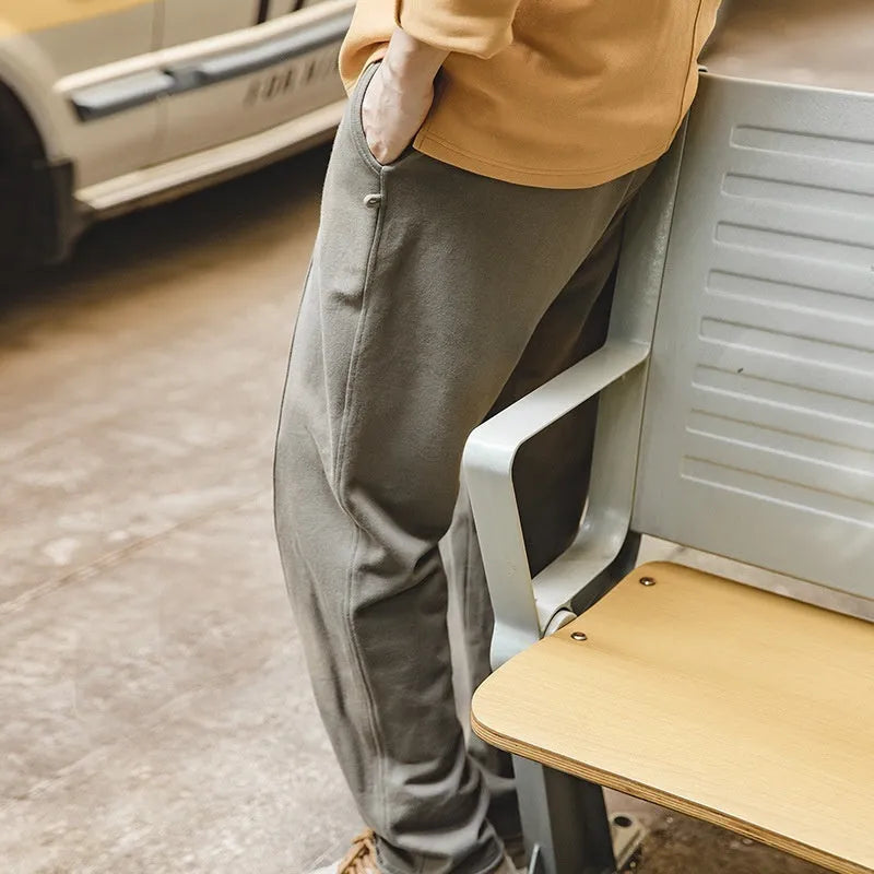 Marden Tooling retro tapered cotton sweatpants in olive green, straight leg with 3D cutting hemming