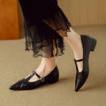 Women's brown cowhide leather flat shoes with rounded toe and soft sole design