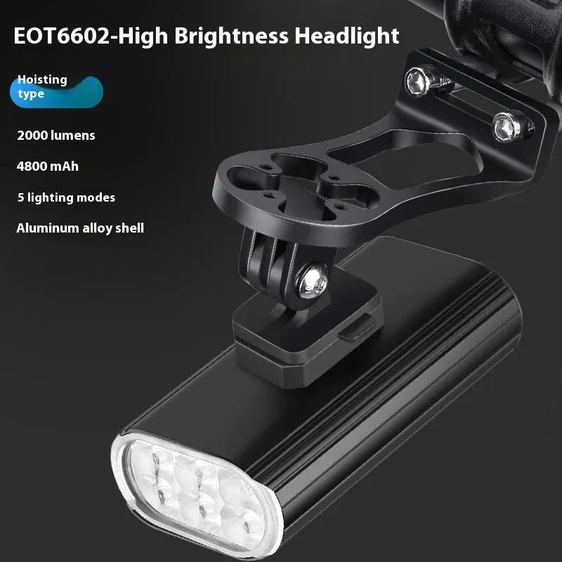 Silver aluminium bicycle headlight showing six XPT lamp beads with USB-C port and quick release mounting brackets