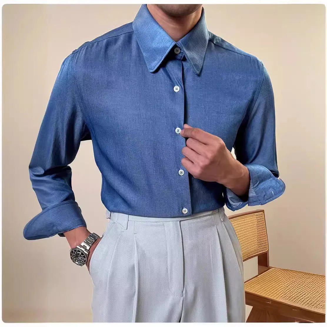 Men's blue slim fit long sleeve shirt with round collar shown in business casual styling