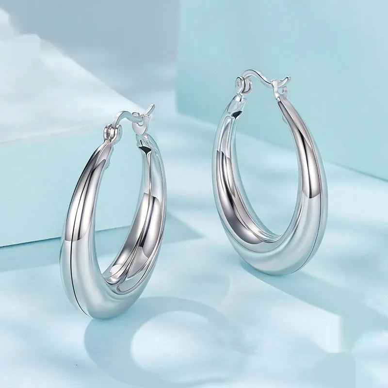 Copper geometric ring ear clip earrings with silver finish in three size options