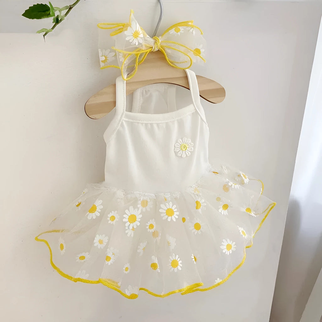 Yellow daisy patterned polyester dog summer clothes shown in size options from XS to XL