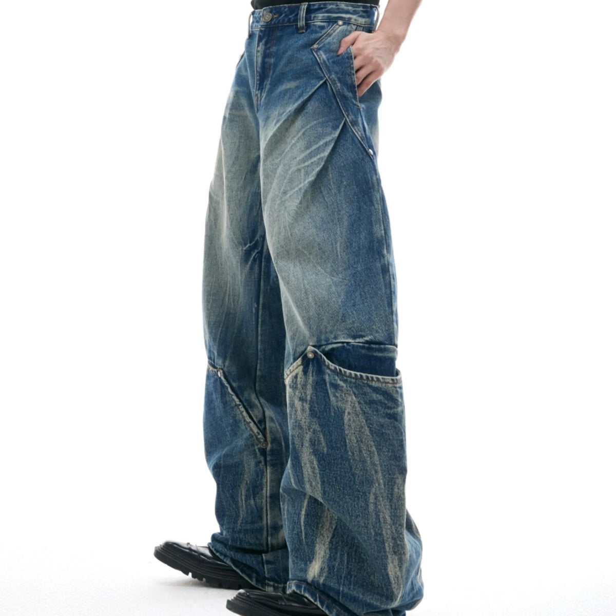 Men's Verdant Blue loose fit jeans with retro washed burst pattern and curved knife design