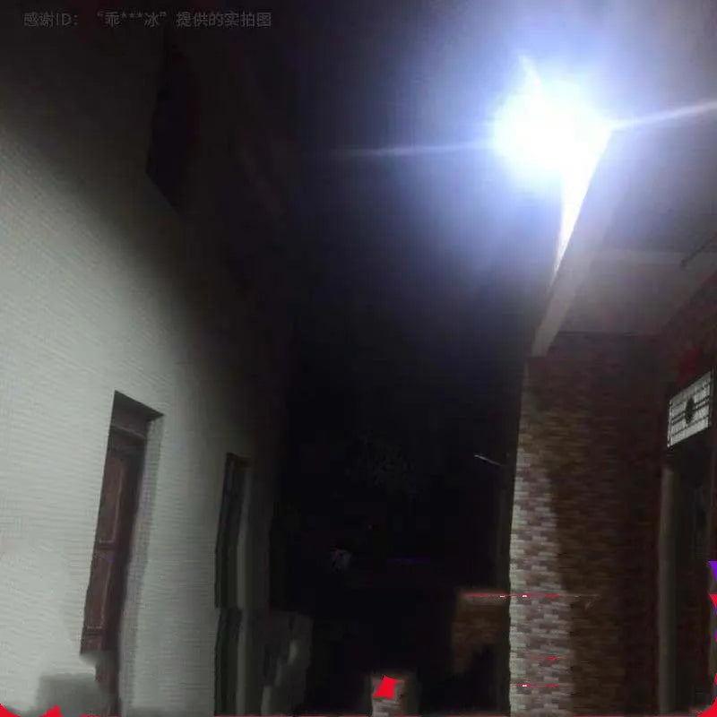 Black solar-powered LED flood light for outdoor garden and security use.