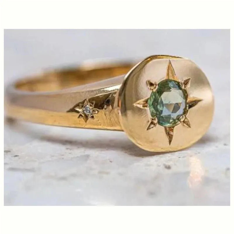 Golden adjustable ring with oval asterism zircon design and star-shaped micro inlay pattern