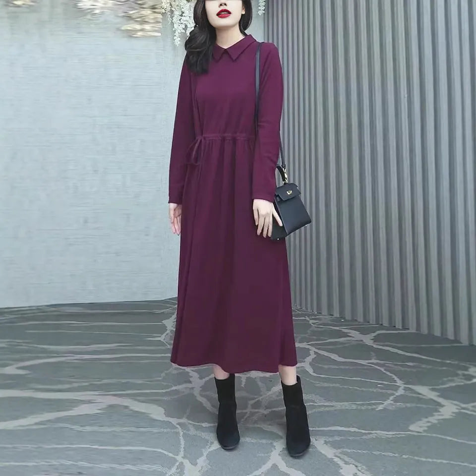 Purplish red women's long sleeve midi dress for winter, shown in a plus size.
