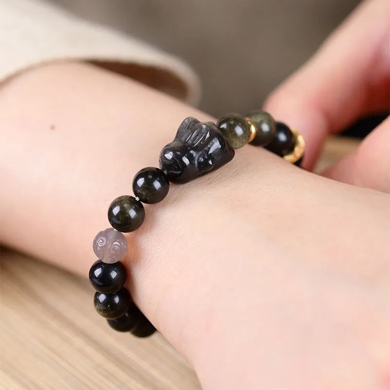 Handmade Chinese national style bracelet with lying rabbit charm and jin yaoshi beads in 8mm size