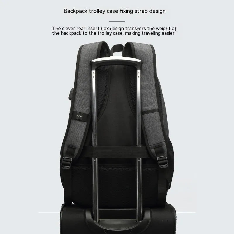 Grey nylon backpack with USB charging port and trolley attachment strap