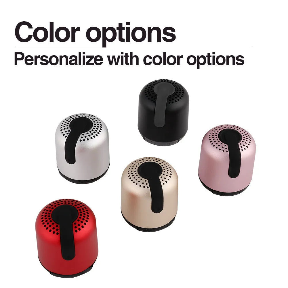Hieha XQ11 cylinder-shaped metal mini Bluetooth speaker in choice of five colours on a plain background.