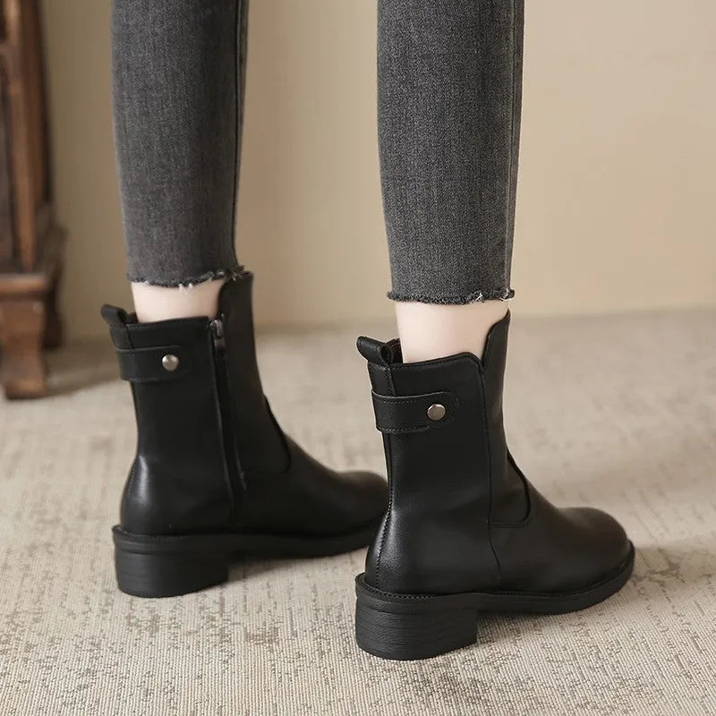 Black women's low heel short boots with round toe and side zipper made of artificial PU