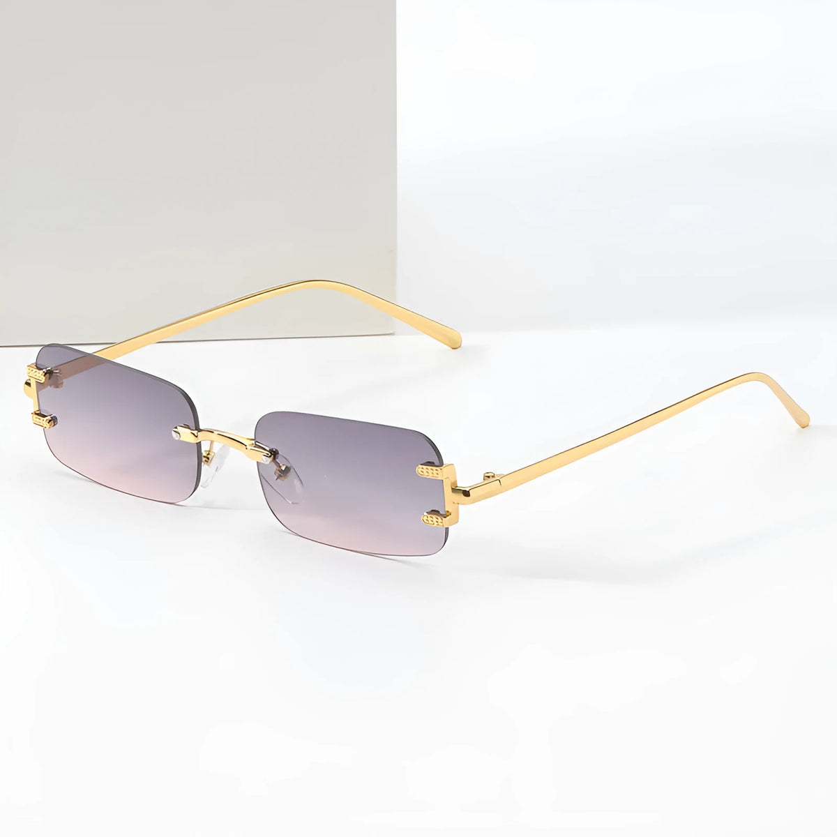 Retro square frameless sunglasses with metal frame and AC lenses, shown in gold or black frame colour options