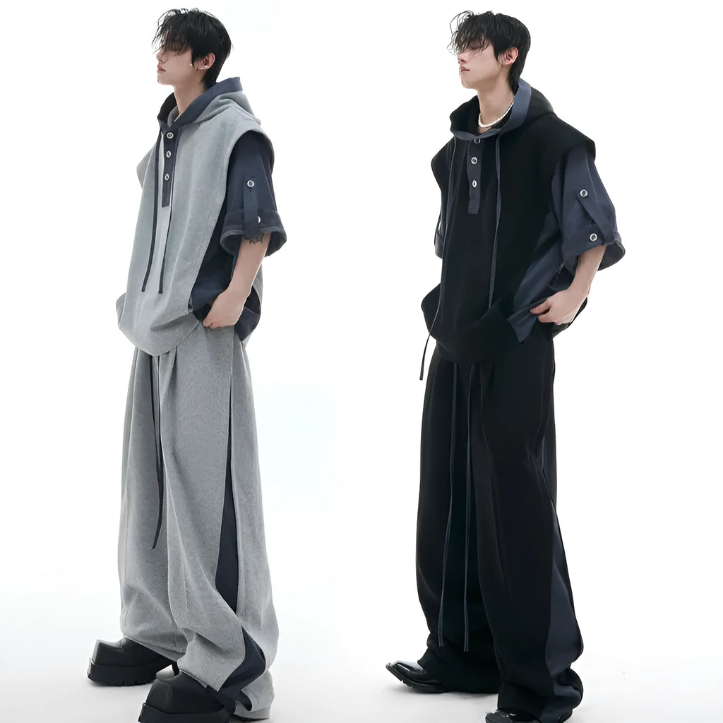 Men's black polyester sports suit with hooded jacket featuring three-dimensional stitching and matching trousers