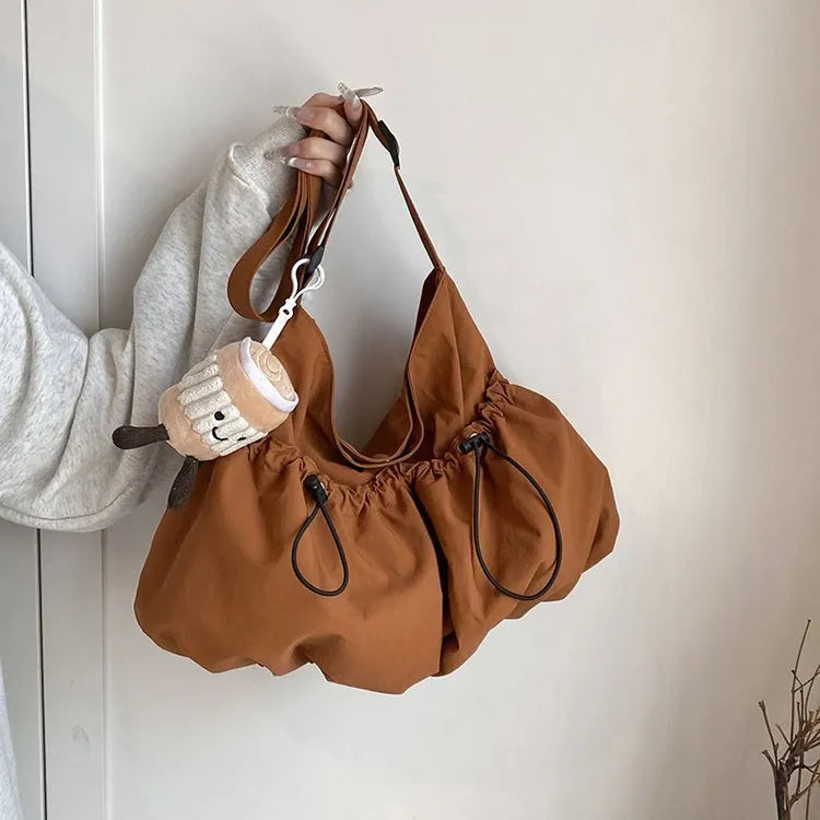 Polyester pleated crossbody student bag in street trend style with foldable design