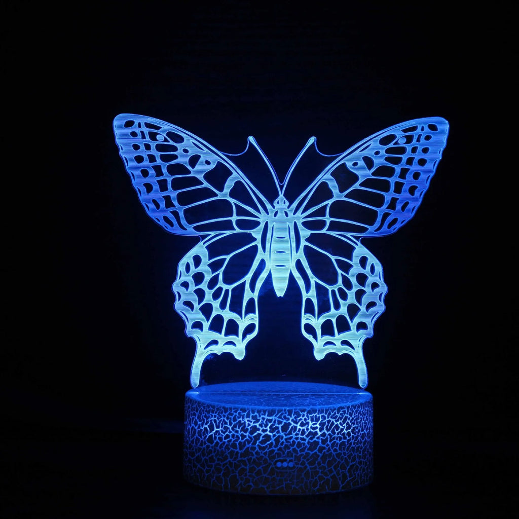 Small acrylic USB table lamp with touch control on a wooden desk.