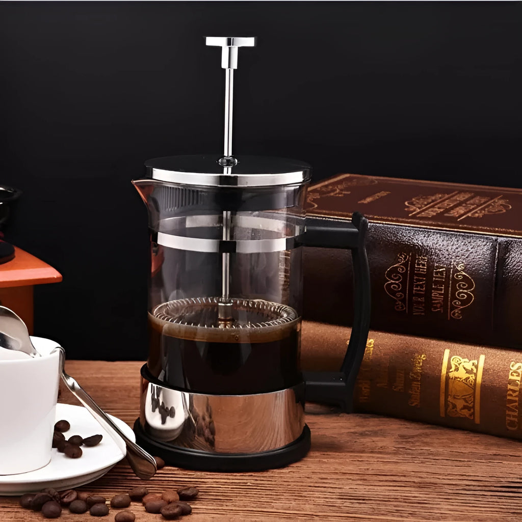 Small glass pour-over coffee maker with stainless steel filter, 350ml capacity.