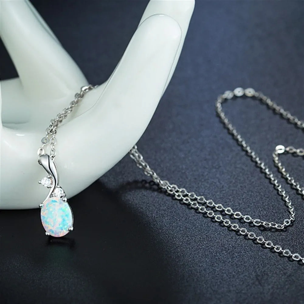 Opal water drop pendant necklace with adjustable chain in rose gold or white finish