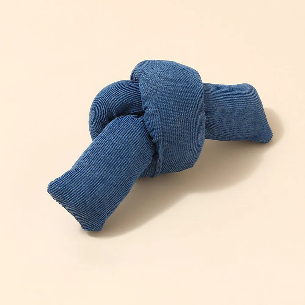 White cotton dog rope toy with multiple knots for tug games and chewing