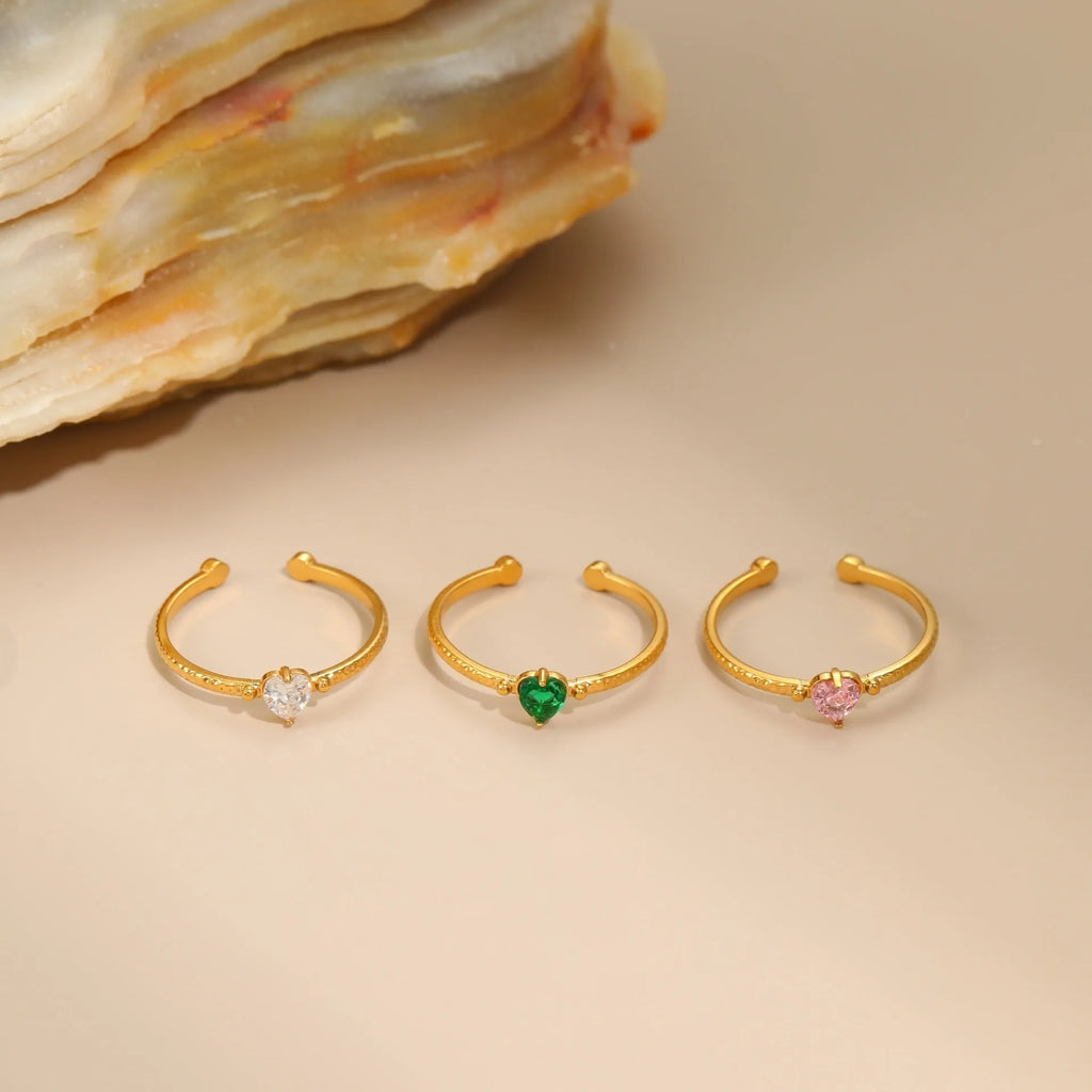 Open ended geometric heart shaped ring with inlaid zircon stones in stainless steel