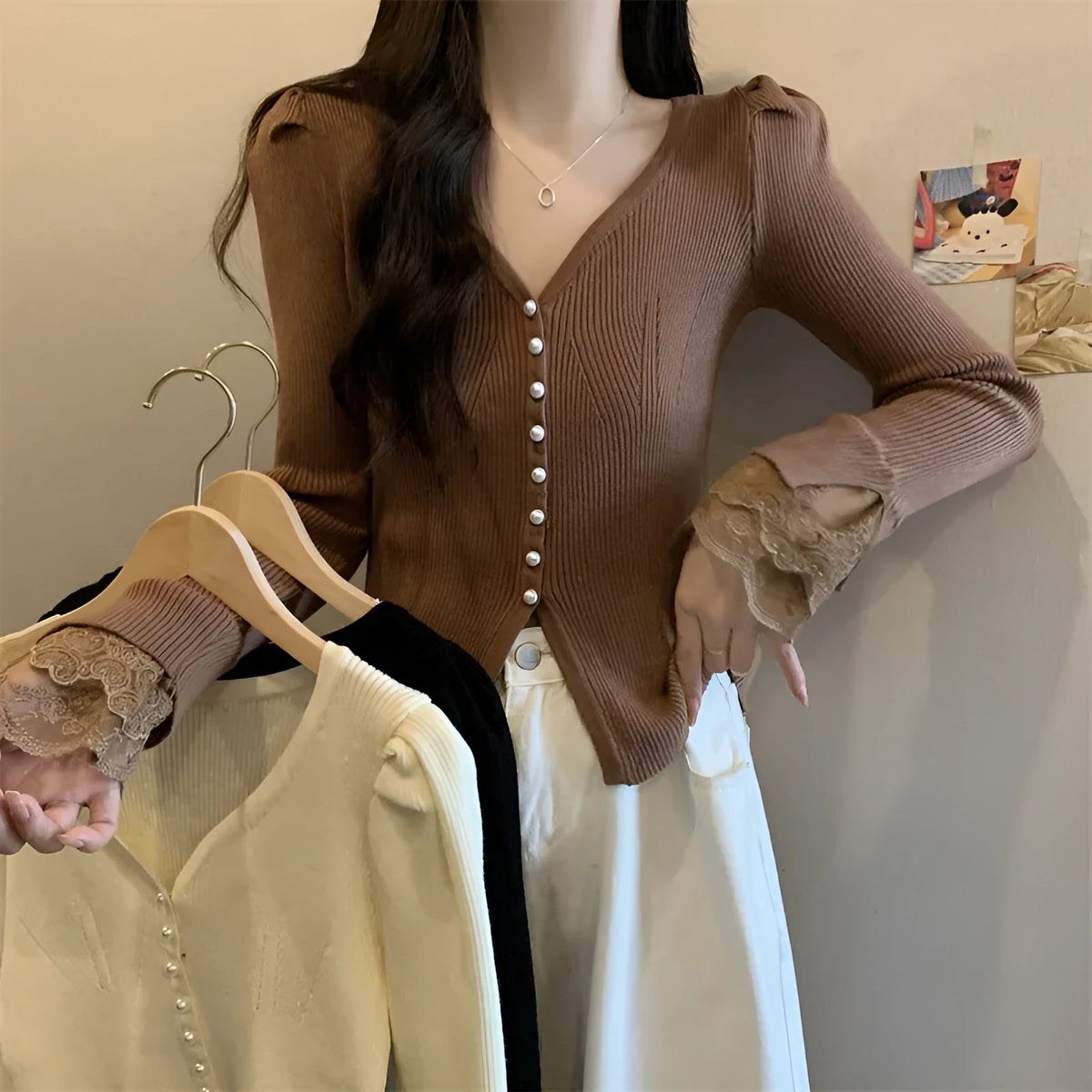 V-neck slim fit long sleeve top in mercerized cotton with lace stitching, shown in black, white, or brown, free size