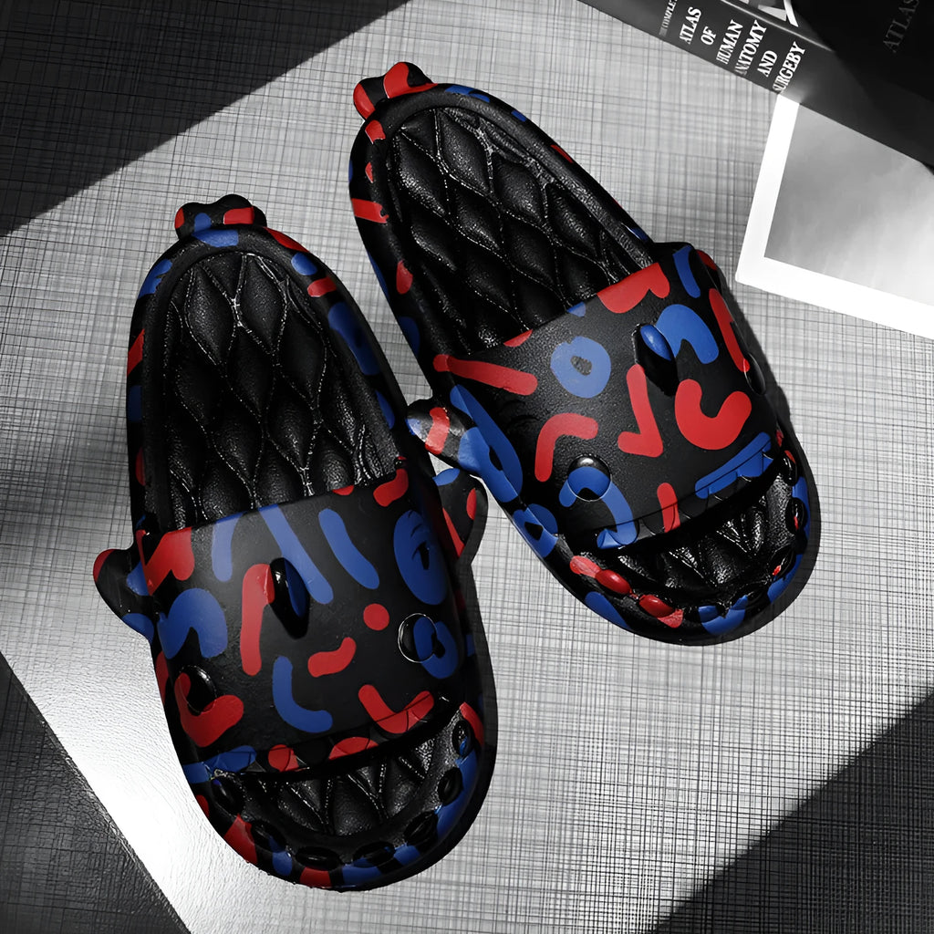 Casual shark design home slippers in EVA material on a plain background.