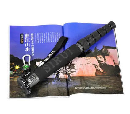 Black carbon fibre SLR camera monopod extended to full height