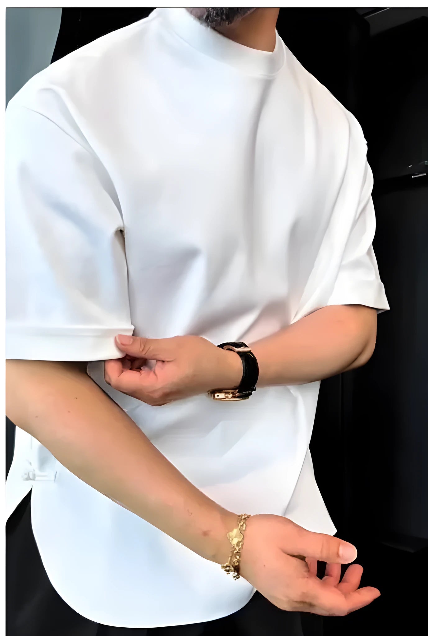Men's white cotton T-shirt with a round hem and a buttoned feature on the front.