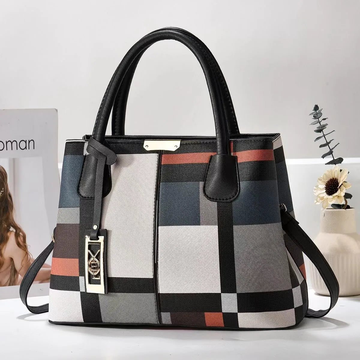 Women's square shoulder bag in soft PU leather with leather strap, shown in multiple colour options