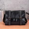 Black Korean-style men's commuter backpack with anti-theft features and sewing thread detailing