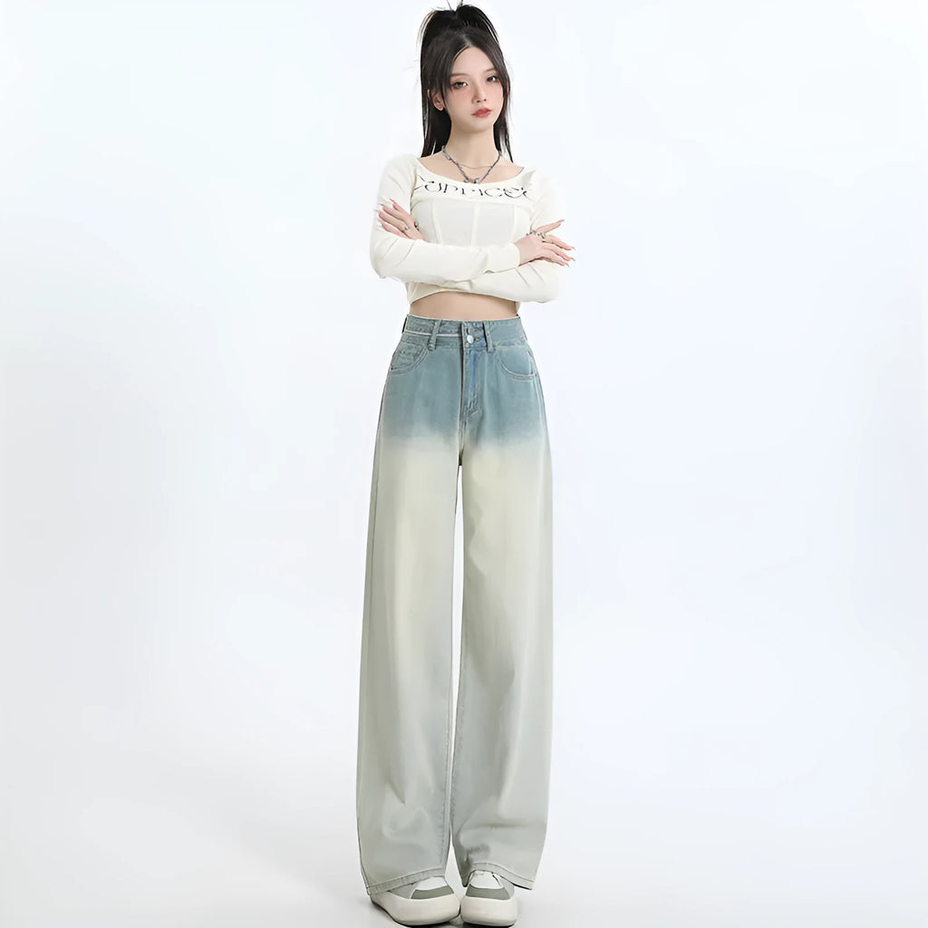 Women's gradient blue straight-leg jeans showing colour transition from lighter to darker blue tones