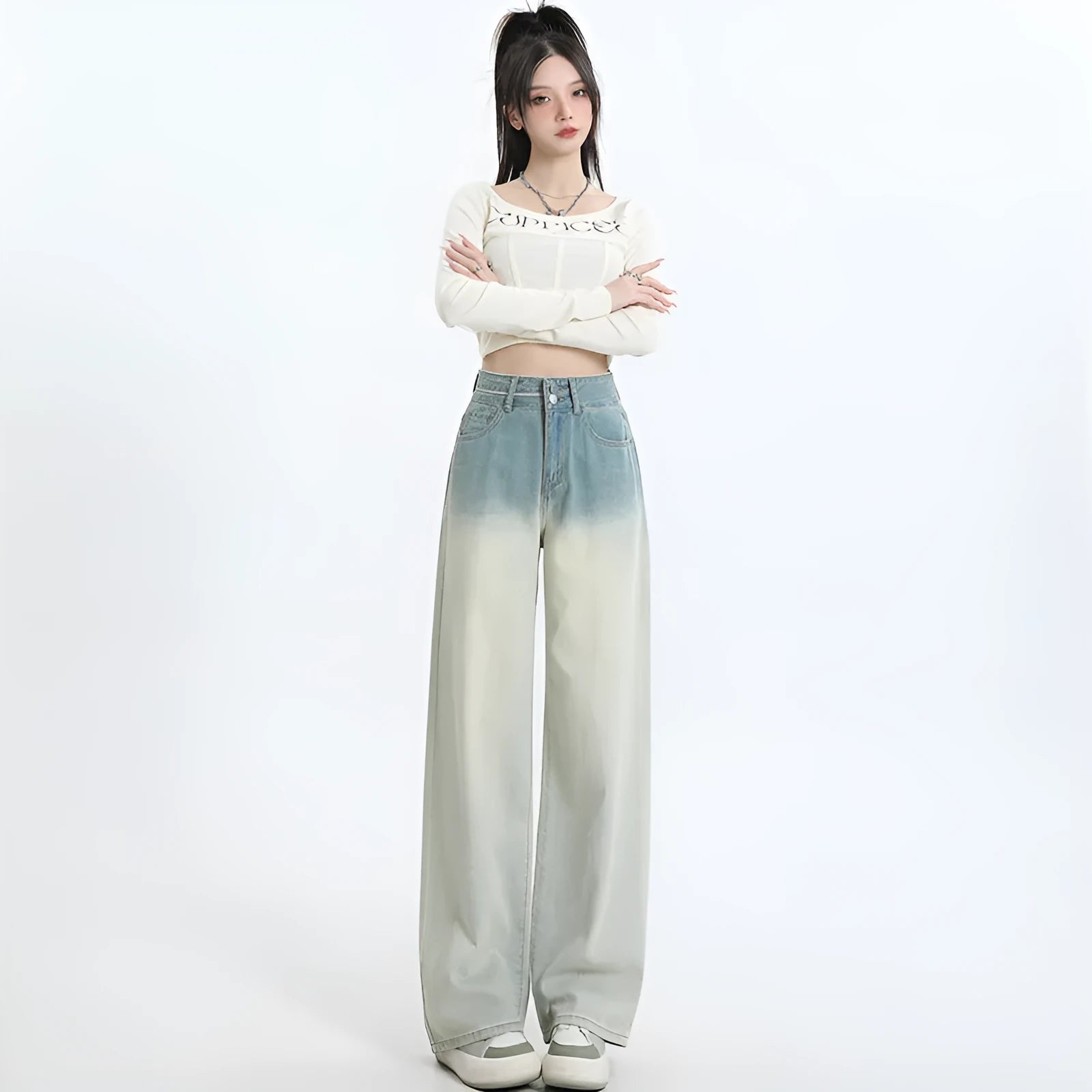 Women's gradient blue straight-leg jeans showing colour transition from lighter to darker blue tones