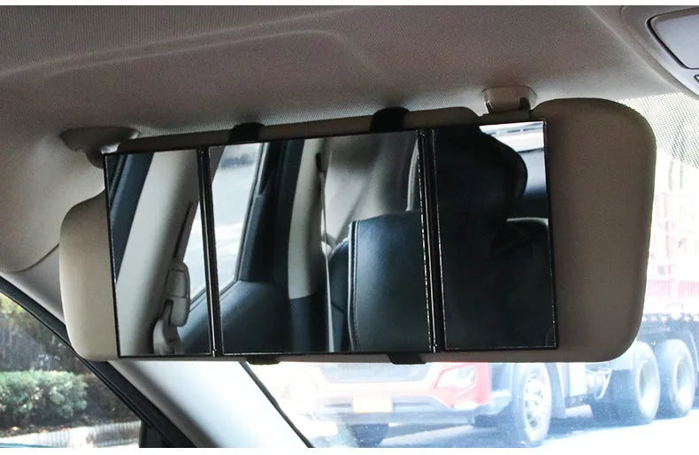 Silver car folding makeup mirror shown closed at 15.5cm wide and opened to 30.5cm wide