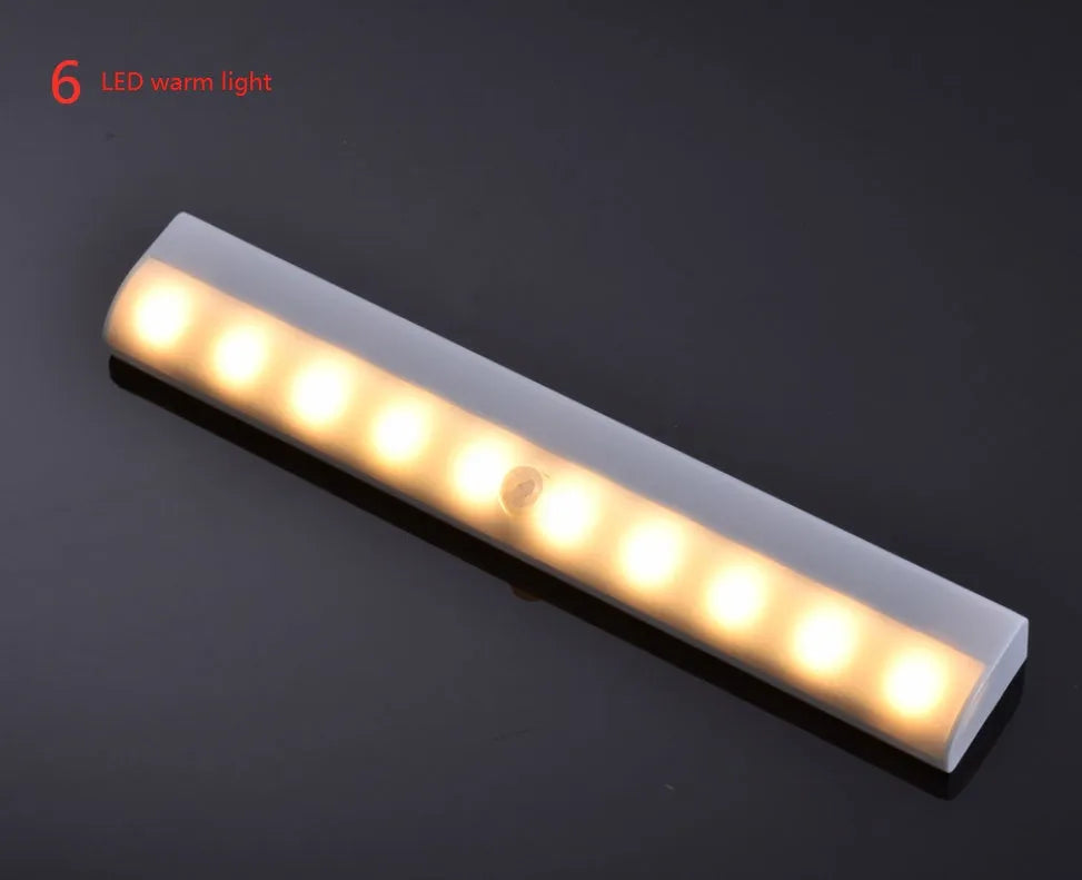 Silver aluminium LED motion sensor light with magnetic back for wardrobe and cupboard mounting.