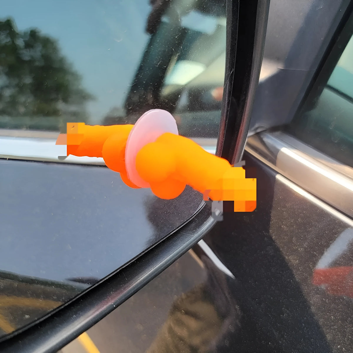 Set of five rubber tyre valve stem caps in pink, black, green, blue, and orange colours