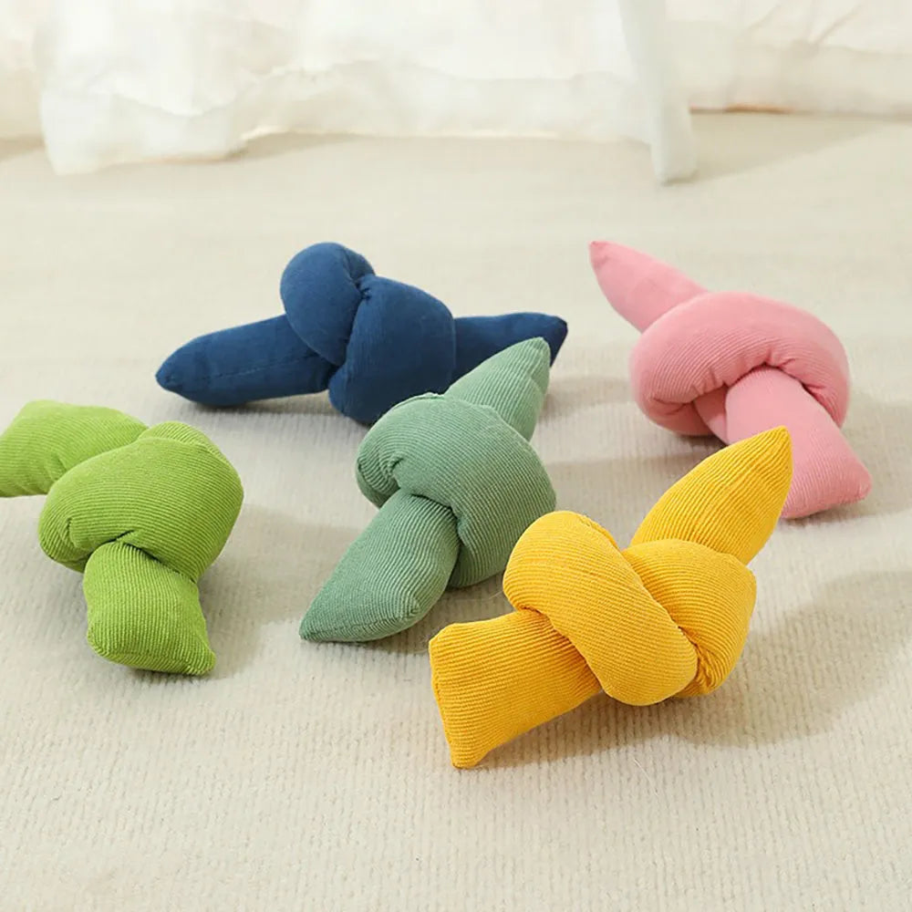 White cotton dog rope toy with multiple knots for tug games and chewing