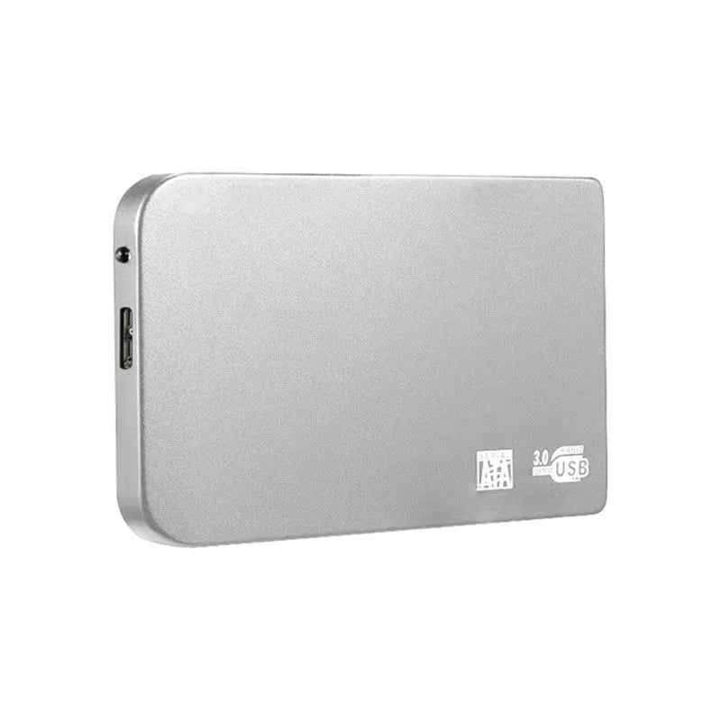 Black USB 3.0 portable solid state drive with metal housing on a desk.