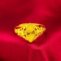 Electroplated gold brass ring with geometric open diamond floral design and textured detailing